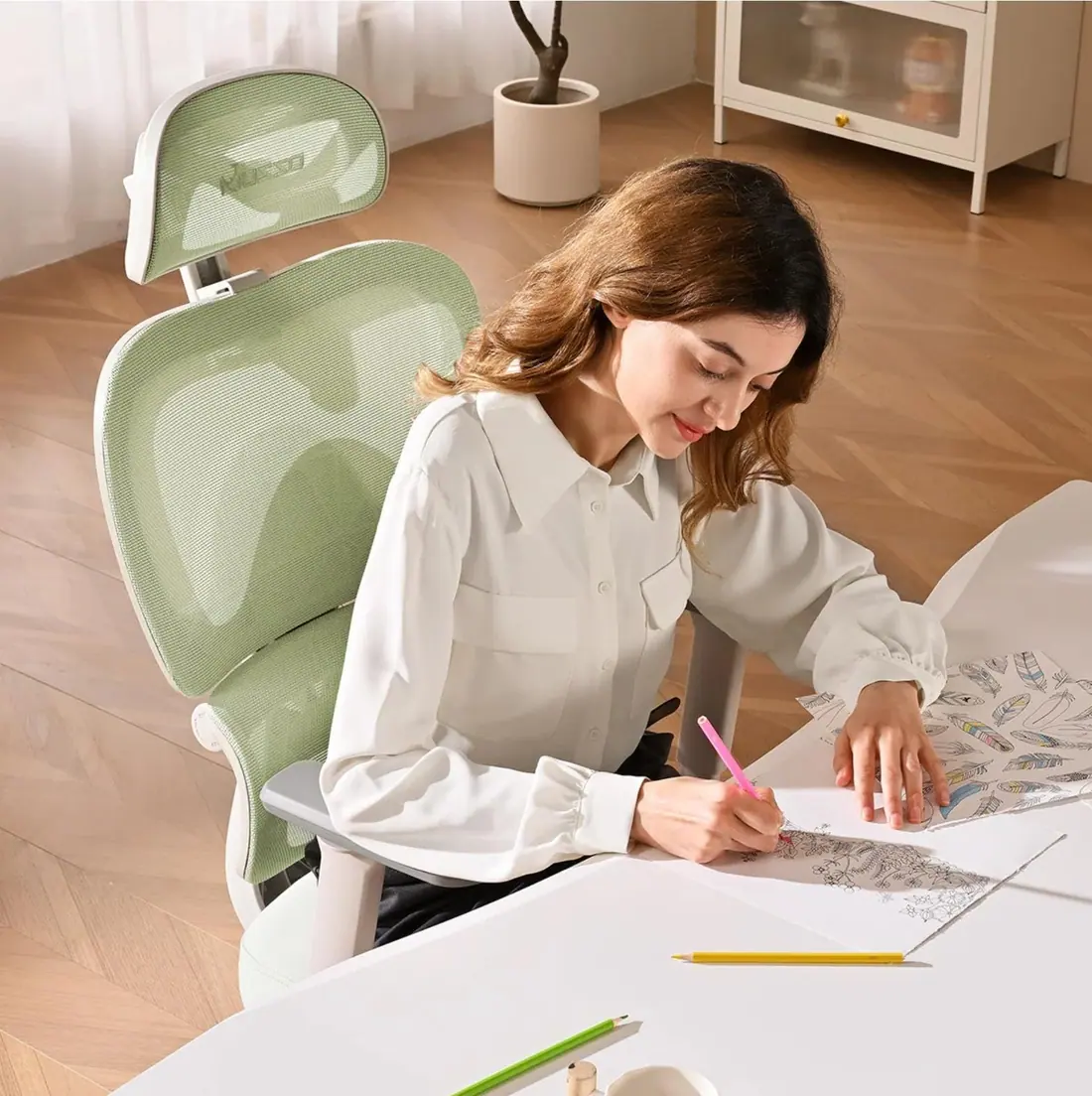 MUSSO · E600 SE, silla ergonómica con reposapiés y lumbar adaptativo